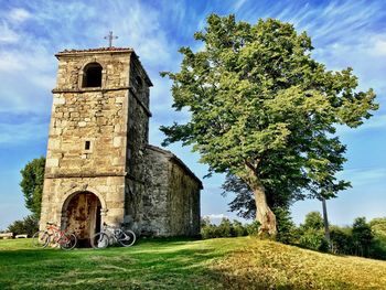 Church on landscape against the sky