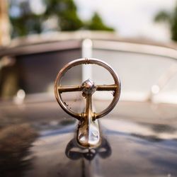 Close-up of metallic object against blurred background