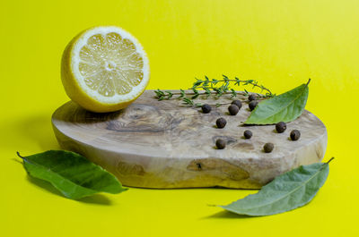 Close-up of lemon slice on table