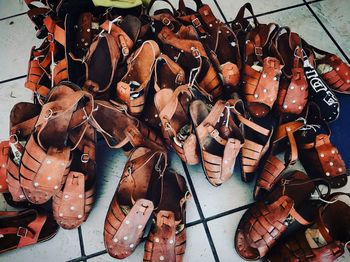 High angle view of shoes for sale at market stall