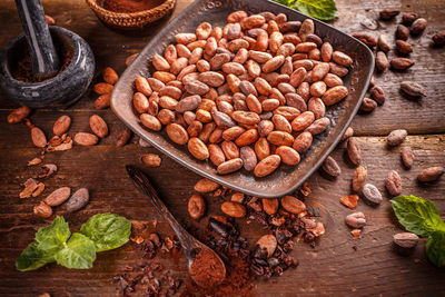 High angle view of roasted coffee beans on table