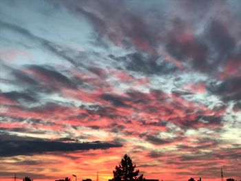 Low angle view of dramatic sky during sunset