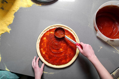 High angle view of woman preparing food