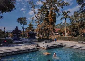 View of swimming pool in front of building