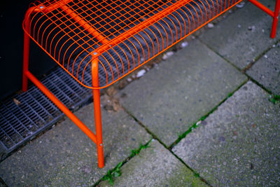 High angle view of orange table on footpath