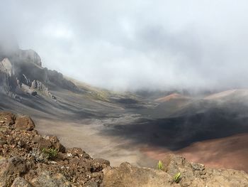 View of volcanic landscape against cloud