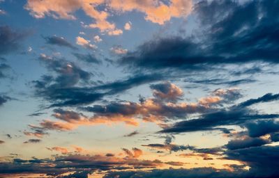 Low angle view of dramatic sky during sunset