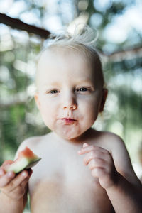 Boy eating watermelon