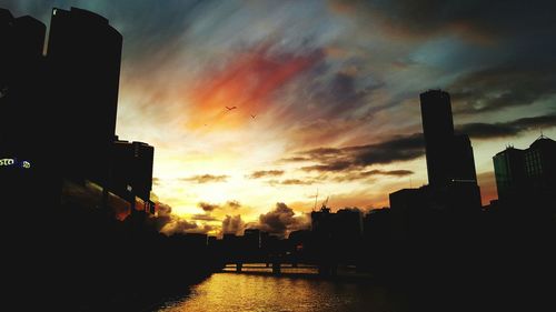 Silhouette of buildings at sunset