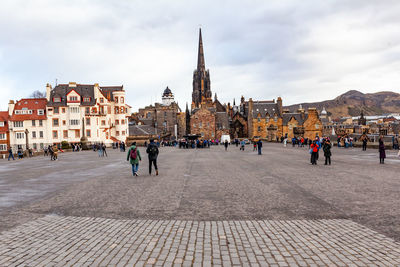 Group of people in front of building
