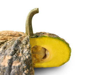 Close-up of bananas against white background