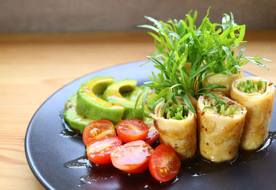 Close-up of food in plate on table