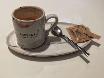 Close-up of coffee cup on table