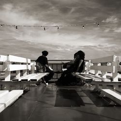 Silhouette of woman against sky