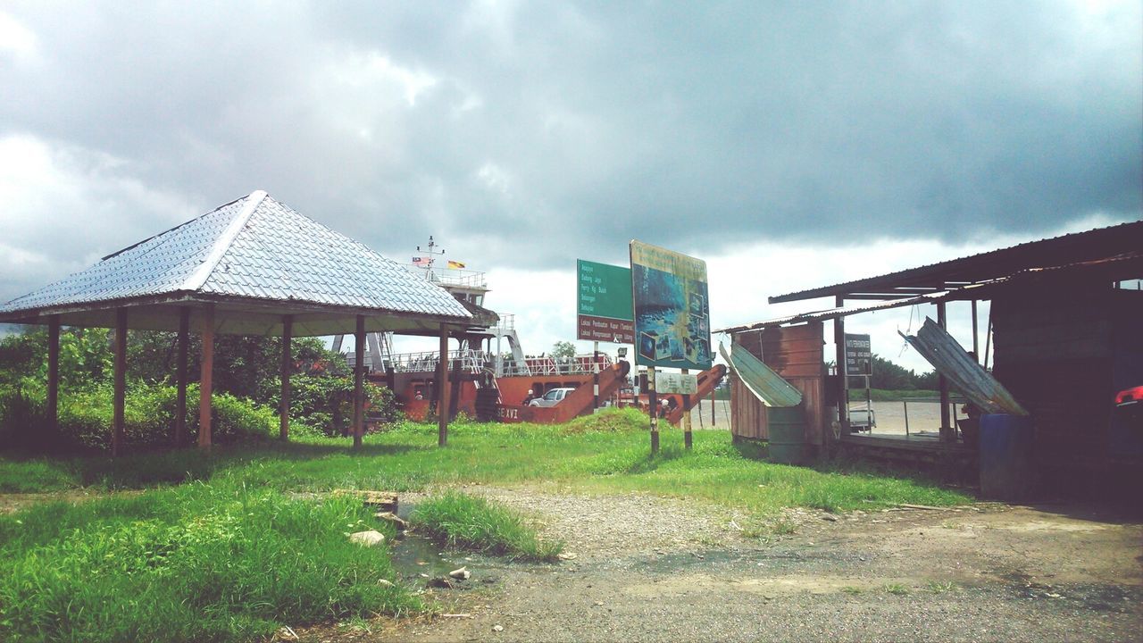 building exterior, architecture, built structure, sky, cloud - sky, cloudy, house, grass, cloud, residential structure, residential building, overcast, weather, field, day, building, outdoors, no people, exterior, nature