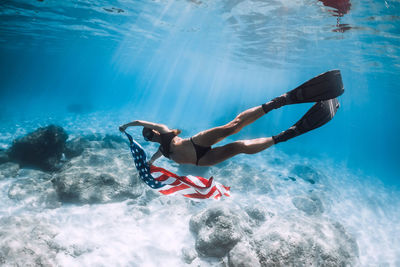 Man swimming in sea