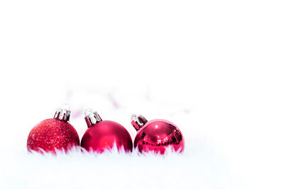 Close-up of christmas decoration against white background