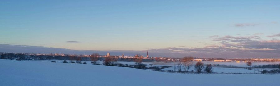 Scenic view of snow covered landscape