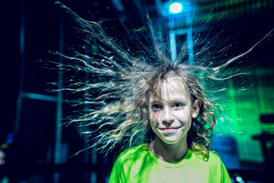 Close-up portrait of girl with tousled hair