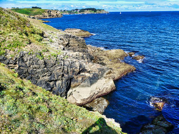 High angle view of rocks on sea