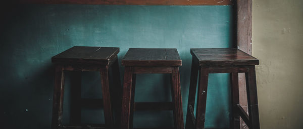High angle view of empty chair on table