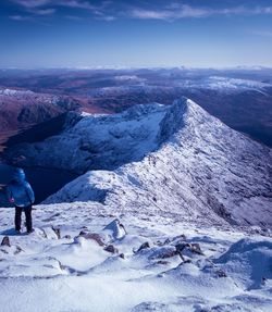 Scenic view of snowcapped mountains during winter