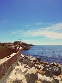 Scenic view of sea against blue sky