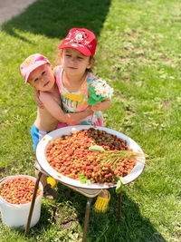 High angle view of food on table with kids