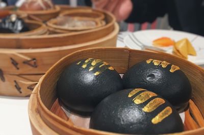 Close-up of bread in plate on table