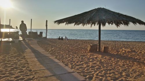 Silhouette of people on beach