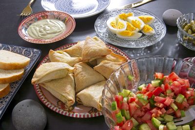 A healthy mediterranean diet. israeli breakfast. vegetable salad, grinding, eggs, pastries, borax