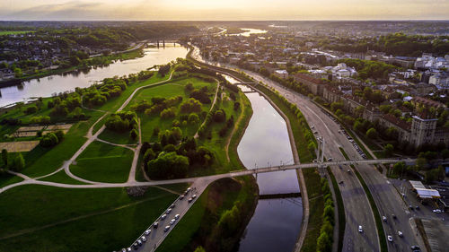 High angle view of river amidst buildings in city