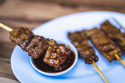 High angle view of meat in plate on table