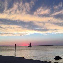 Scenic view of sea against sky at sunset