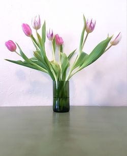 Close-up of flower vase on table