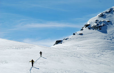 Scenic view of snowcapped mountain against sky