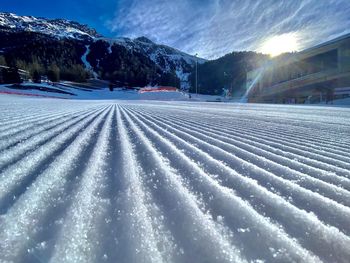Snow covered mountains against sky