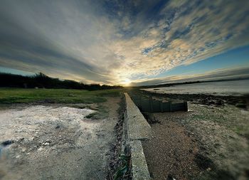 Scenic view of landscape against sky during sunset