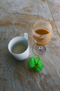 High angle view of coffee cup on table