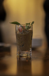 Close-up of beer glass on table