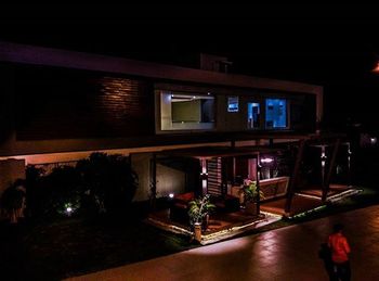 View of illuminated restaurant at night