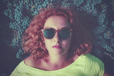 Close-up portrait of girl wearing sunglasses