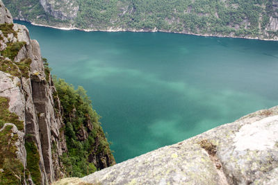 High angle view of rocks by sea