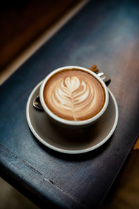 High angle view of cappuccino on table