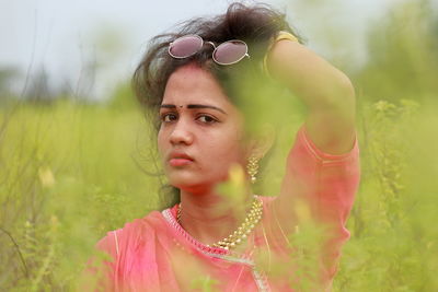 Portrait of young woman in traditional clothing