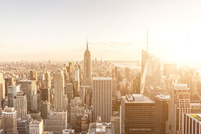 High angle view of city buildings against sky