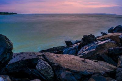 Scenic view of sea against sky during sunset