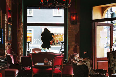 Rear view of people sitting in restaurant