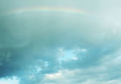 Low angle view of rainbow in sky