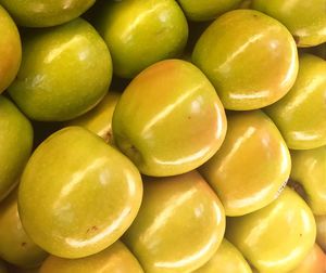 Full frame shot of granny smith apples for sale at market